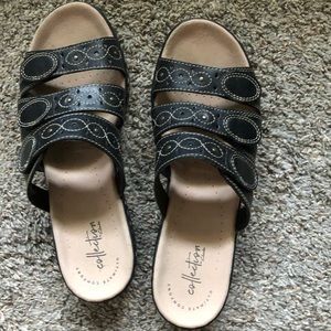 Black Clark’s sandals size 9